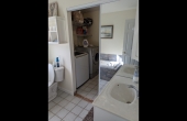 Attached Bathroom with laundry